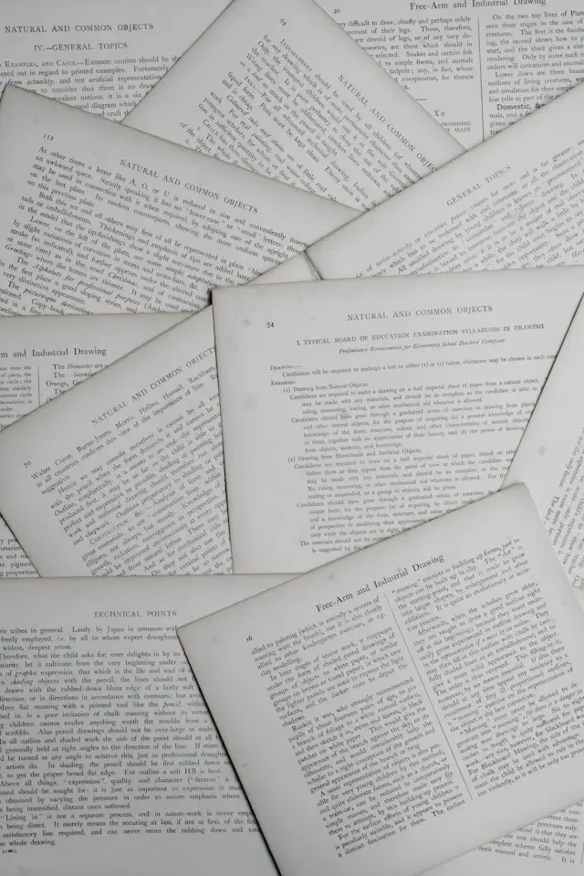 several flat sheets of paper overlapped